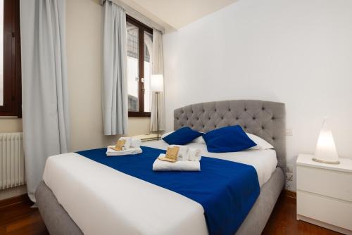 Postel nebo postele na pokoji v ubytování A 10 passi da san marco