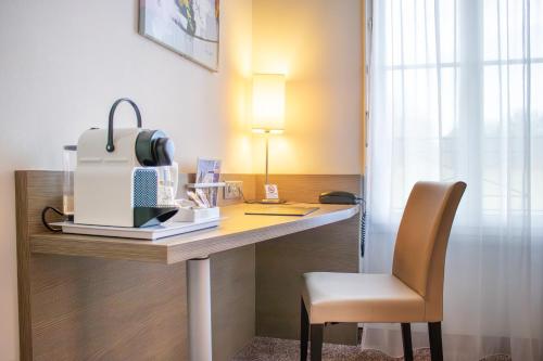 Παροχές για τσάι/καφέ στο Brit Hotel Châteaudun
