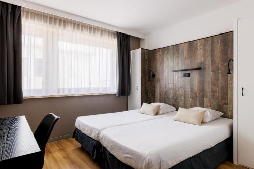 Postel nebo postele na pokoji v ubytování Hotel Cavalli by WP Hotels