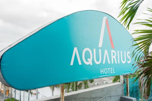 Un certificado, premio, letrero u otro documento en Hotel Aquarius