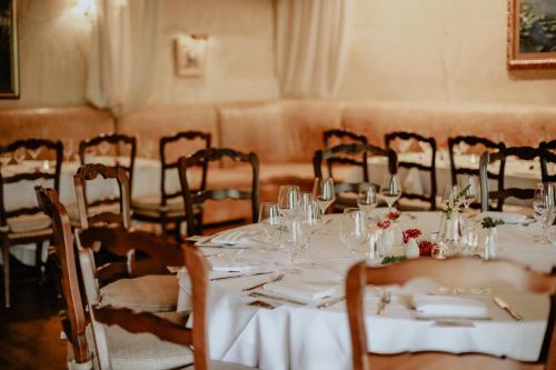 a table set up for a wedding in a room at Mirbeau Inn & Spa - Skaneateles in Skaneateles