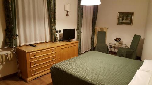 Cama o camas de una habitación en Albergo Conca Verde