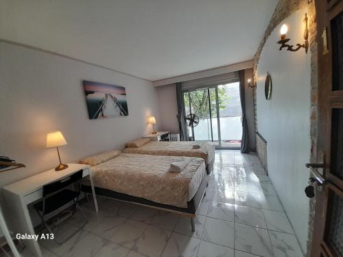 Ένα ή περισσότερα κρεβάτια σε δωμάτιο στο Sci LS