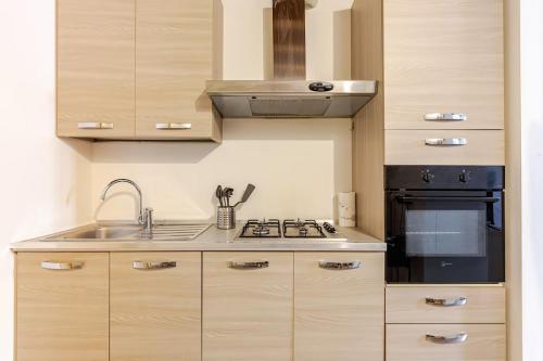 Η κουζίνα ή μικρή κουζίνα στο Artistic Urban Apartment
