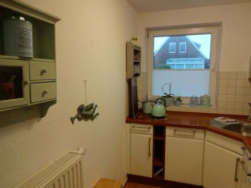 Kuchyň nebo kuchyňský kout v ubytování Ferienhaus Eric