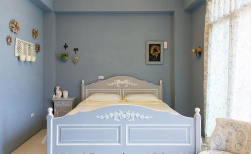 Llit o llits en una habitació de Wei Sen House