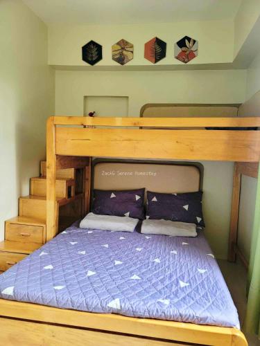 Ένα ή περισσότερα κρεβάτια σε δωμάτιο στο ZackG Homestay At Brenthill 406
