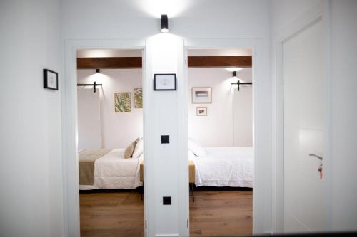 Ένα ή περισσότερα κρεβάτια σε δωμάτιο στο Casa Rural Toledillo