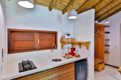 Dapur atau dapur kecil di Casa e Pousada Alecrim