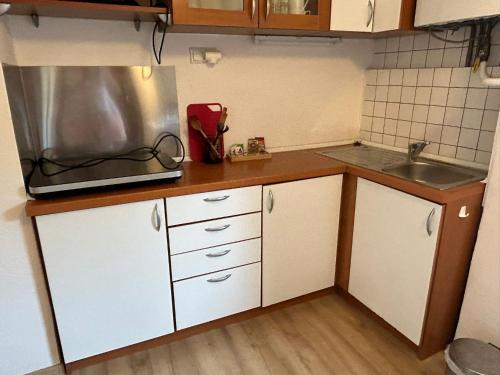 Η κουζίνα ή μικρή κουζίνα στο Apartman Meda
