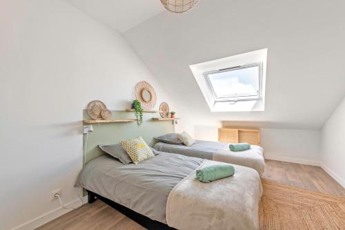 Postel nebo postele na pokoji v ubytování La Maison du Treustel - Combrit - Chez Thomas & Elodie