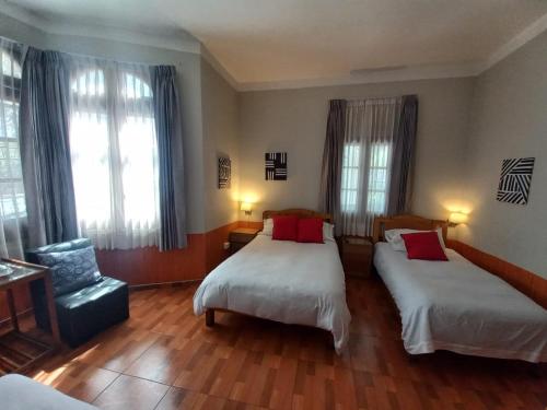 เตียงในห้องที่ Runcu Arequipa