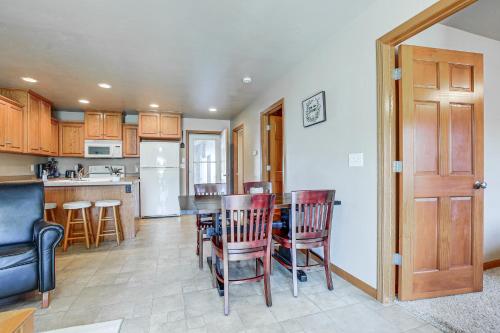 a kitchen and dining room with a table and chairs at Family-Friendly Unit 8 Mi to Appleton Downtown! in Appleton