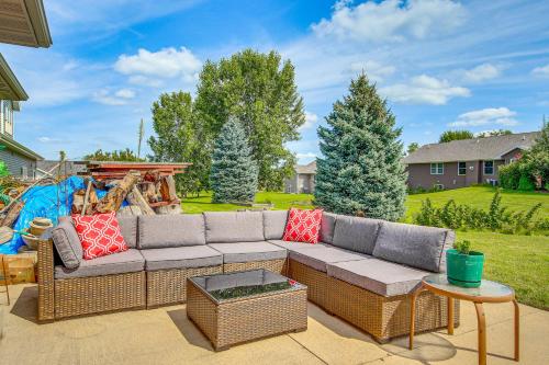 a patio with a couch and a table at Family-Friendly Unit 8 Mi to Appleton Downtown! in Appleton