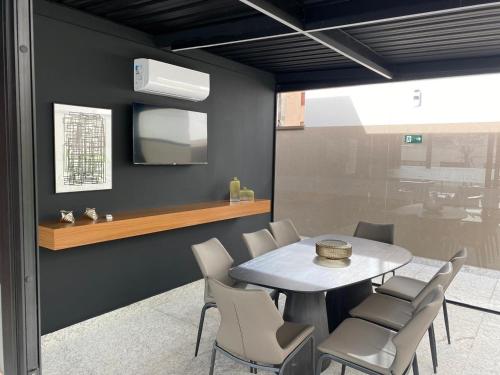 Fotografie z fotogalerie ubytování Studio aconchegante no centro v destinaci Poços de Caldas