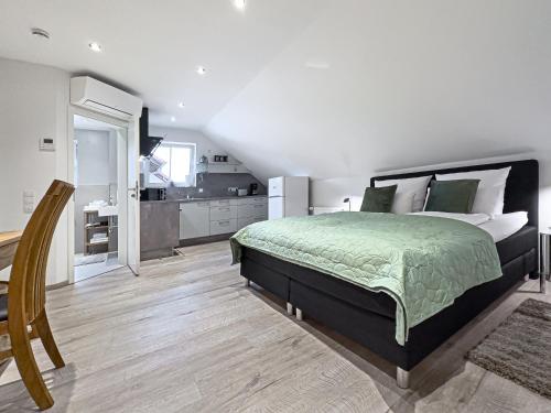 Кровать или кровати в номере TDYHOMES Hotel