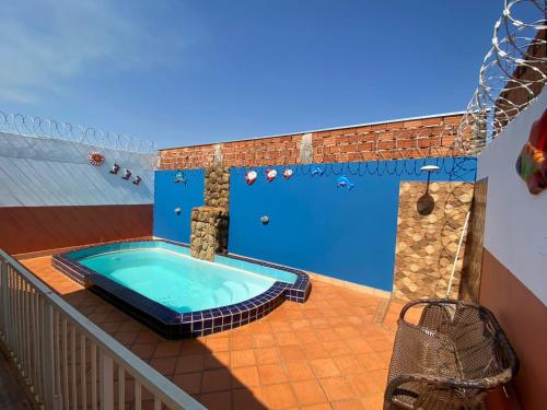Πισίνα στο ή κοντά στο Casa temporada com piscina para 6 pessoas