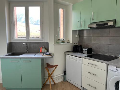Kuchyň nebo kuchyňský kout v ubytování Guimbert'Home