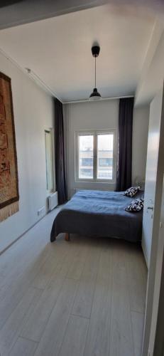 Postel nebo postele na pokoji v ubytování Apartment in seaside Helsinki 83M2 with Sauna boat to Estonia 450 m from apartment