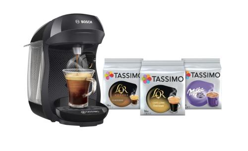 a coffee maker and a cup of coffee and a box of biscuits at Musieges Appart'Hôtel in Musièges