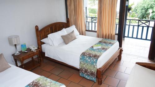 Photo de la galerie de l'établissement Comfandi Hotel Los Veleros, à Calima