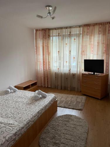 Ένα ή περισσότερα κρεβάτια σε δωμάτιο στο Cheia Sufletului