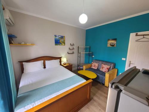 Ένα ή περισσότερα κρεβάτια σε δωμάτιο στο My Apartments Rooms Durres