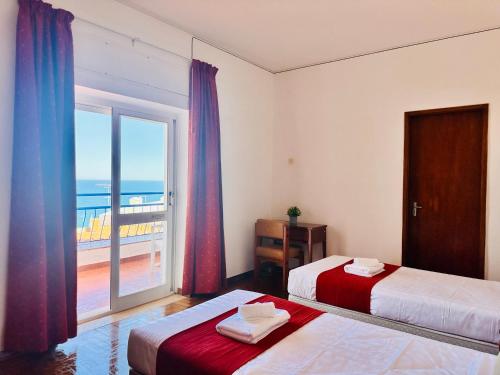 Postel nebo postele na pokoji v ubytování Vila Bela Hotel