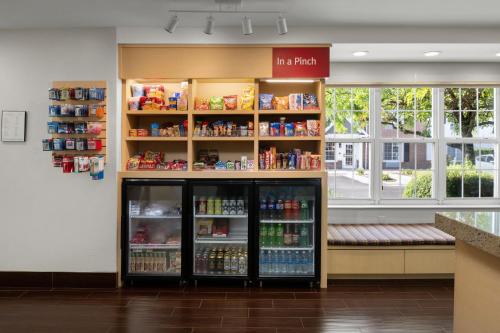 a store with a drink cooler in a store at TownePlace Suites Salt Lake City Layton in Layton