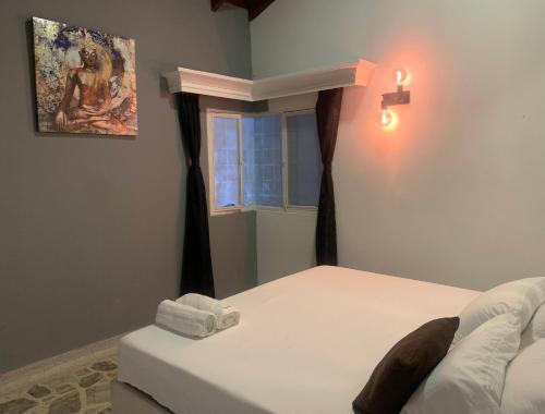 Luxury Villa at Poblado 6 BDRM Epic Manorにあるベッド