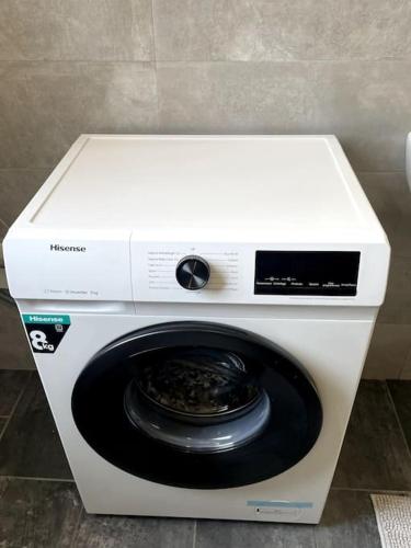 a washing machine with its door open in a room at Arte in Mantova in Mantova