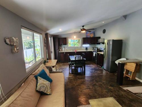 a living room with a couch and a table and a kitchen at #17A Hermosa Beach Bungalow 1st floor 1 bedroom Apt in Playa Hermosa