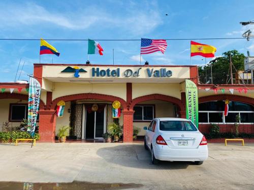 a car parked in front of a hotel old value at Hotel Del Valle in El Naranjo