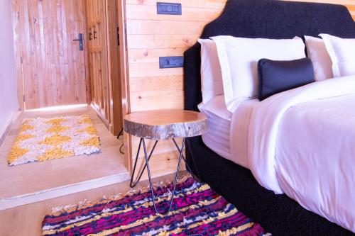 Postel nebo postele na pokoji v ubytování Bio et Bois -Luxury Bio Farm-