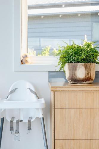 a kitchen with a sink and a potted plant on a counter at Haven Views Harmers Haven in Cape Paterson