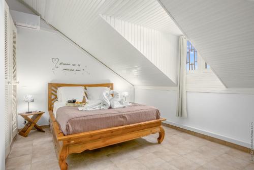Postel nebo postele na pokoji v ubytování Superbe Duplex T2 Grand Rivière 3 étoiles