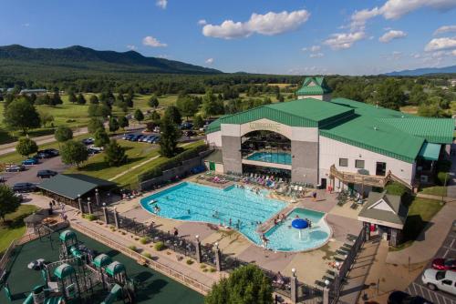 an overhead view of a pool at a resort at RiverWinds - Modern Charm Near Shenandoah National Park in Luray