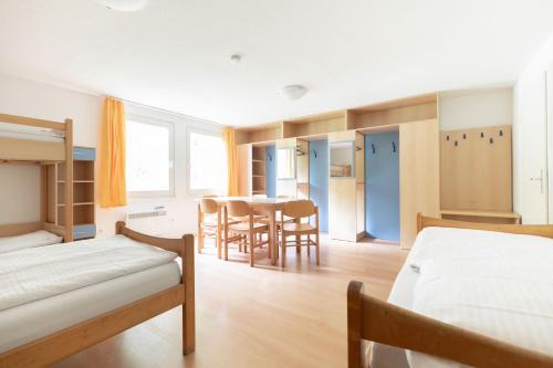 Un pat sau paturi într-o cameră la budget seezeit-resort am Werbellinsee