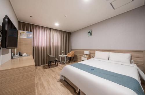 Postel nebo postele na pokoji v ubytování Blue Mountain Hotel