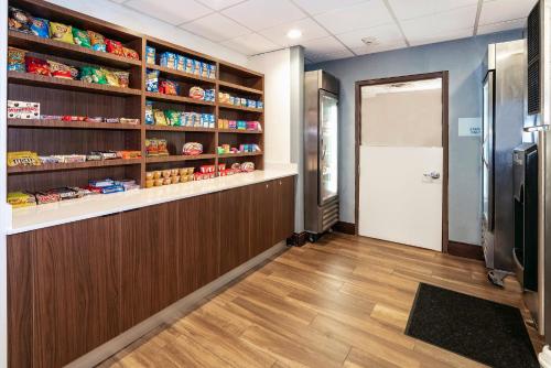 a pharmacyacistacist corridor with a door and a pharmacyacistacistacistacistacist at Holiday Inn Express & Suites Walterboro by IHG in Walterboro