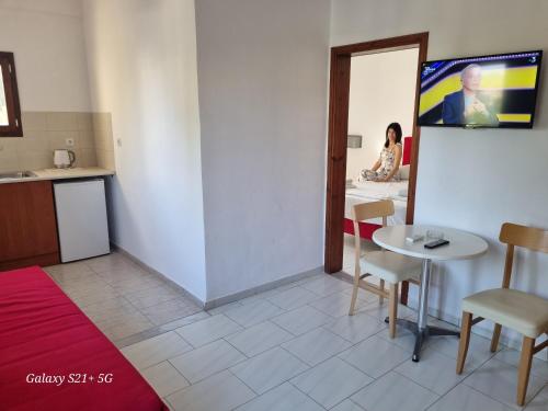 Kuchyň nebo kuchyňský kout v ubytování Arhodiko Hotel