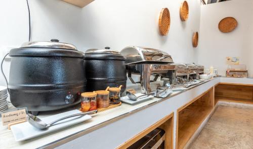 Kuchyň nebo kuchyňský kout v ubytování Ai Pai Hotel