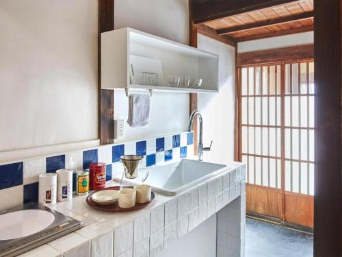 Kuchyň nebo kuchyňský kout v ubytování Yasaka no Yado