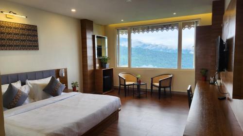 Ένα ή περισσότερα κρεβάτια σε δωμάτιο στο Voyage The Royal Retreat