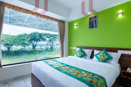 Voodi või voodid majutusasutuse Treebo Airsuite Airport Hotel toas
