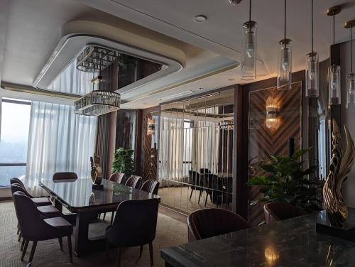 a dining room with a table and chairs at Muong Thanh Luxury Cao Bang in Cao Bằng