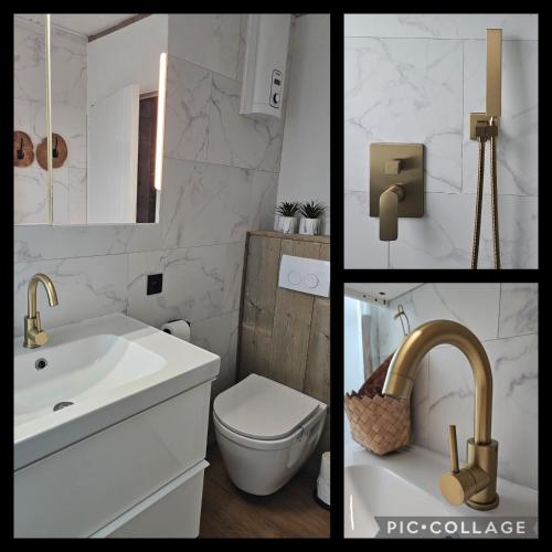 a white bathroom with a sink and a toilet at O'Blanche, Viroinval Treignes in Treignes