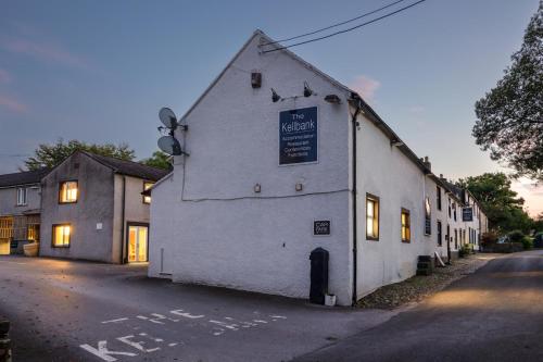 a white building on the side of a street at The Kellbank in Gosforth