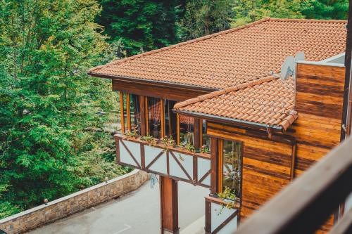 an overhead view of a house with a balcony at Hotel Bozhentsi in Chernevtsi