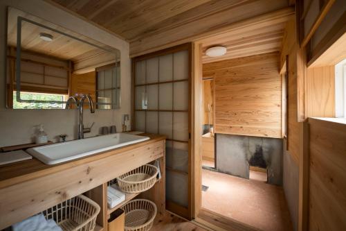 Koupelna v ubytování アイショウ 一日ひと組の宿